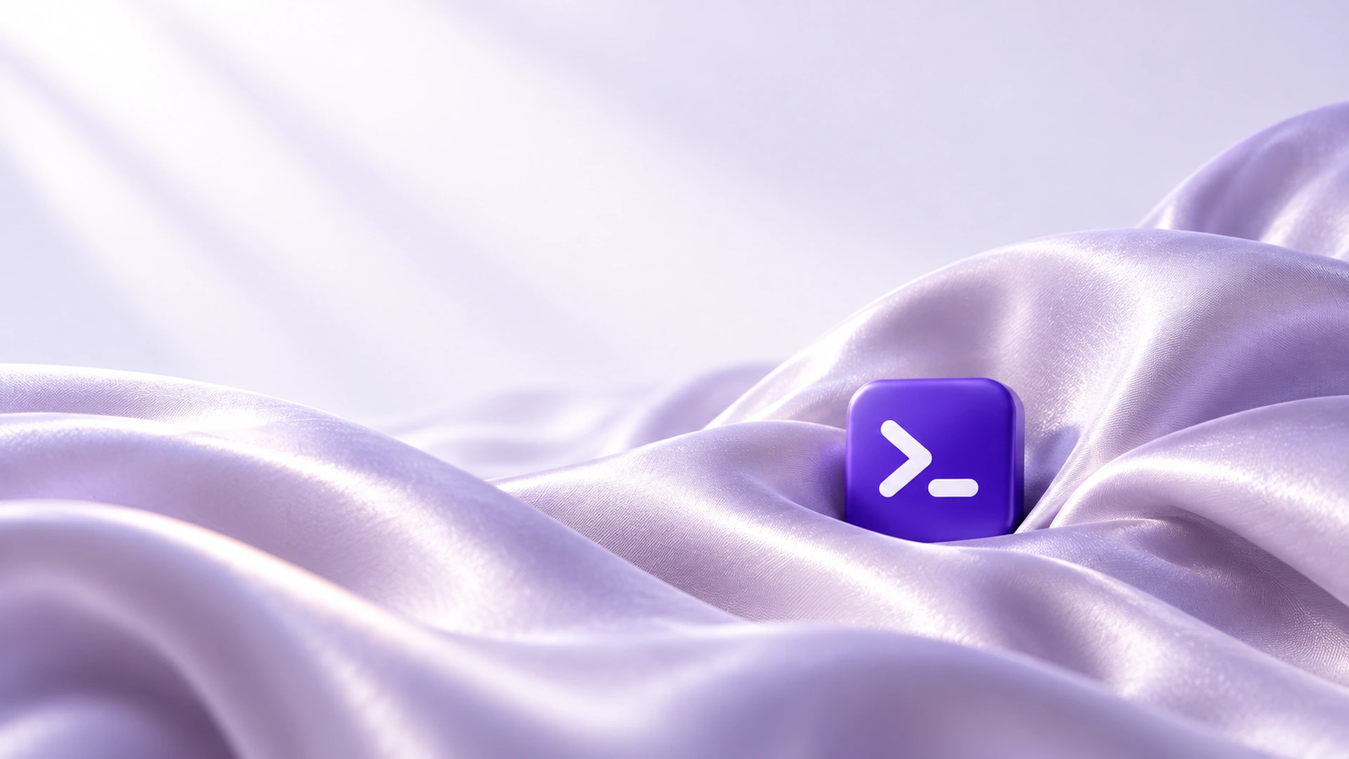 A purple terminal prompt tile resting among flowing violet satin folds, light desktop composition